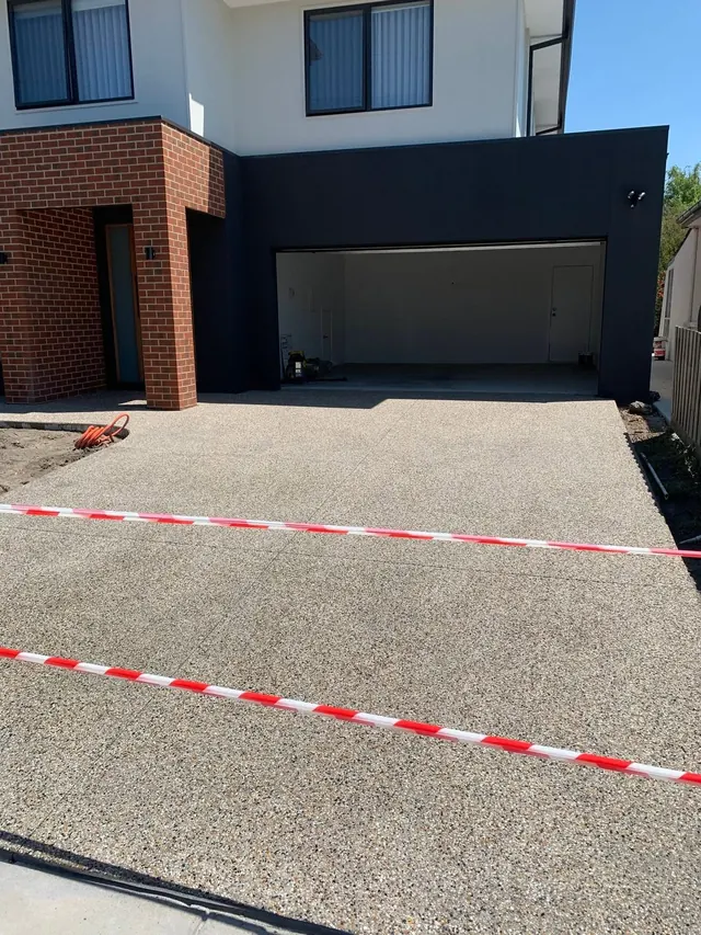 Exposed aggregate driveway at a townhouse